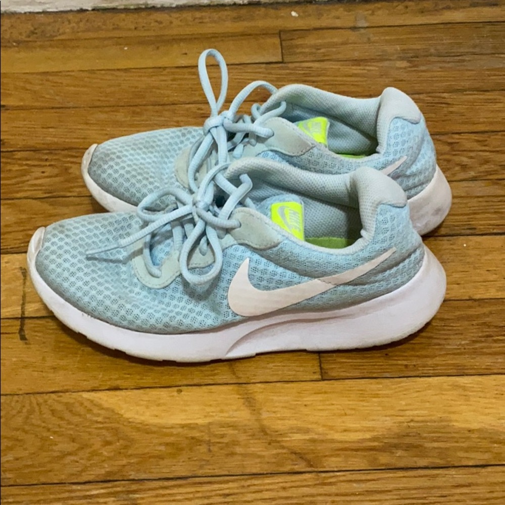 Light blue Nike Tanjuns
